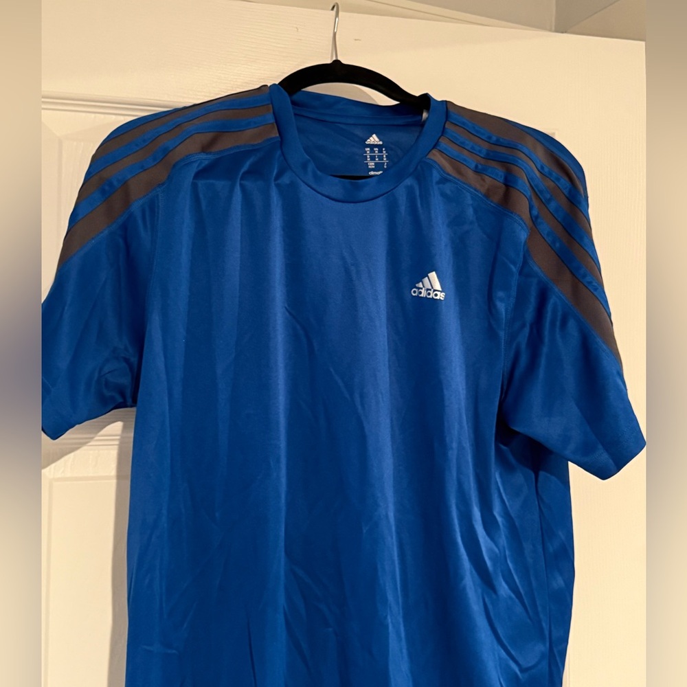 Adidas athletic shirt 
Size M